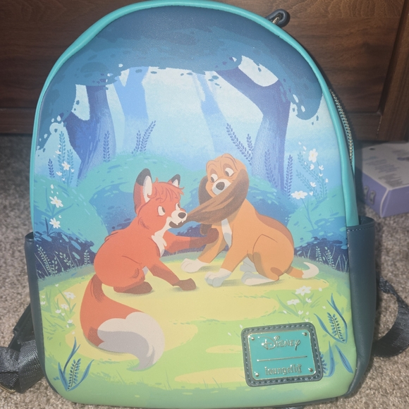 Disney Loungefly Teal and Green Backpack - Picture 1 of 4